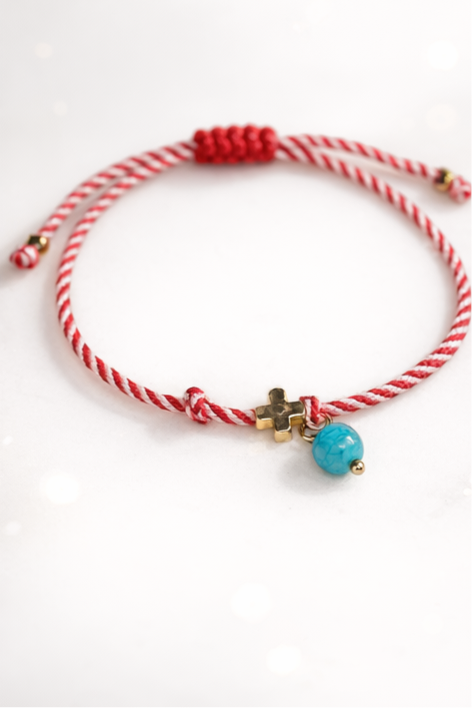Cross and blue bead bracelet