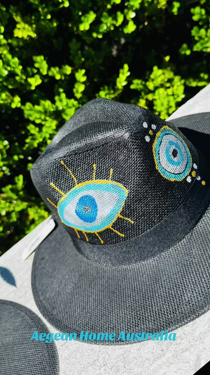 White mati (eye) hat